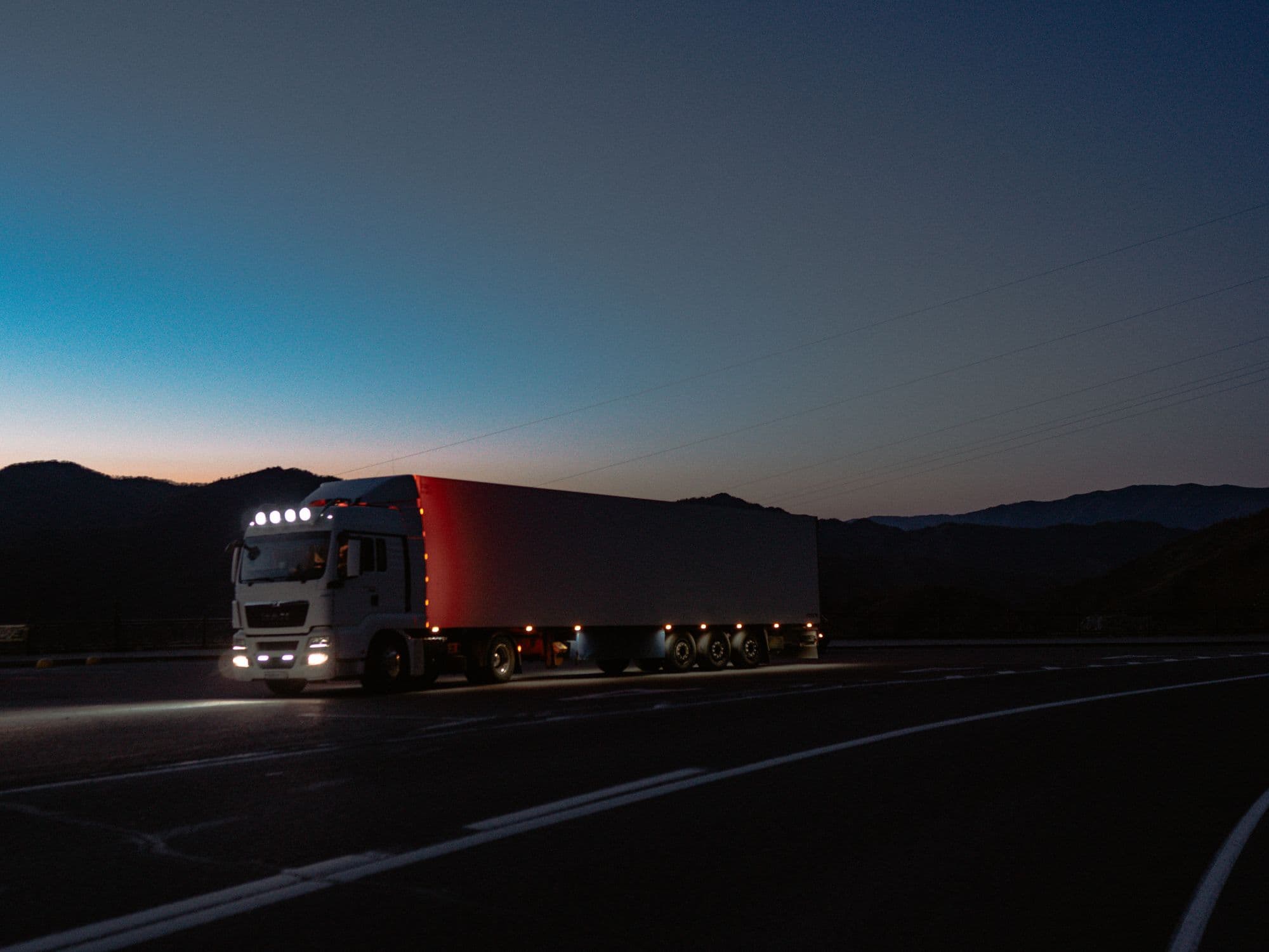 Truck on the road at dusk